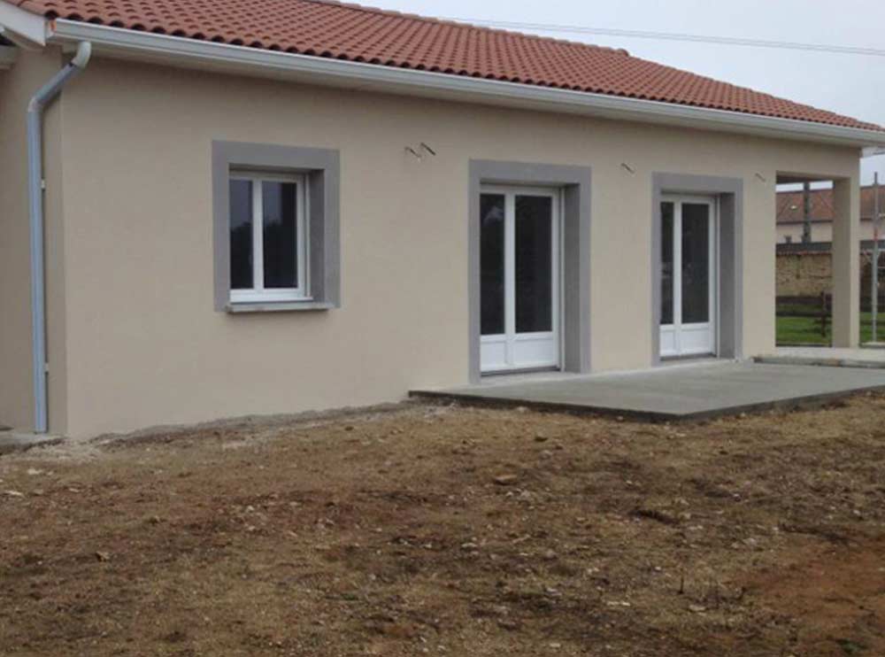 Maison avec façade crépi beige — réalisation NF DécorFaçade